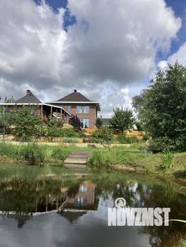 Коттедж 338м², 2-этажный, участок 12 сот.