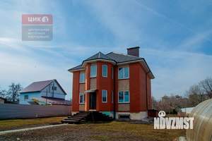 Коттедж 253м², 3-этажный, участок 14 сот.  
