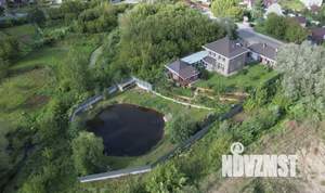 Коттедж 338м², 2-этажный, участок 12 сот.  